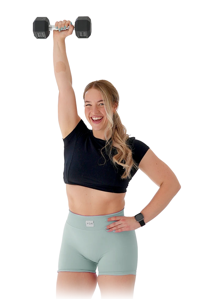Mandy holding weight and smiling